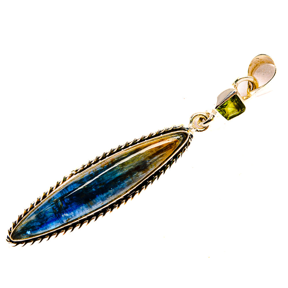 Leaf-shaped kyanite pendant with green peridot accent and silver-tone setting, gold bail