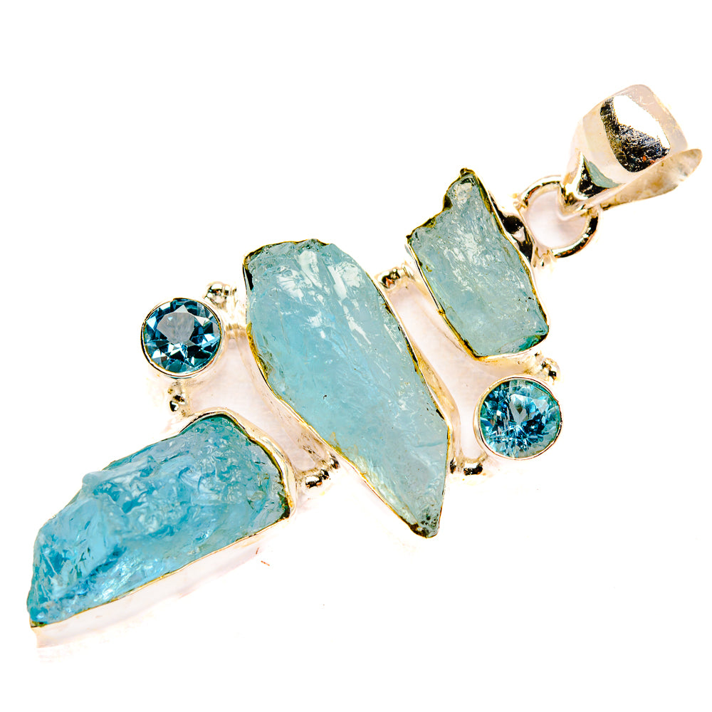 Sterling silver rough aquamarine pendant with blue topaz accents, bail