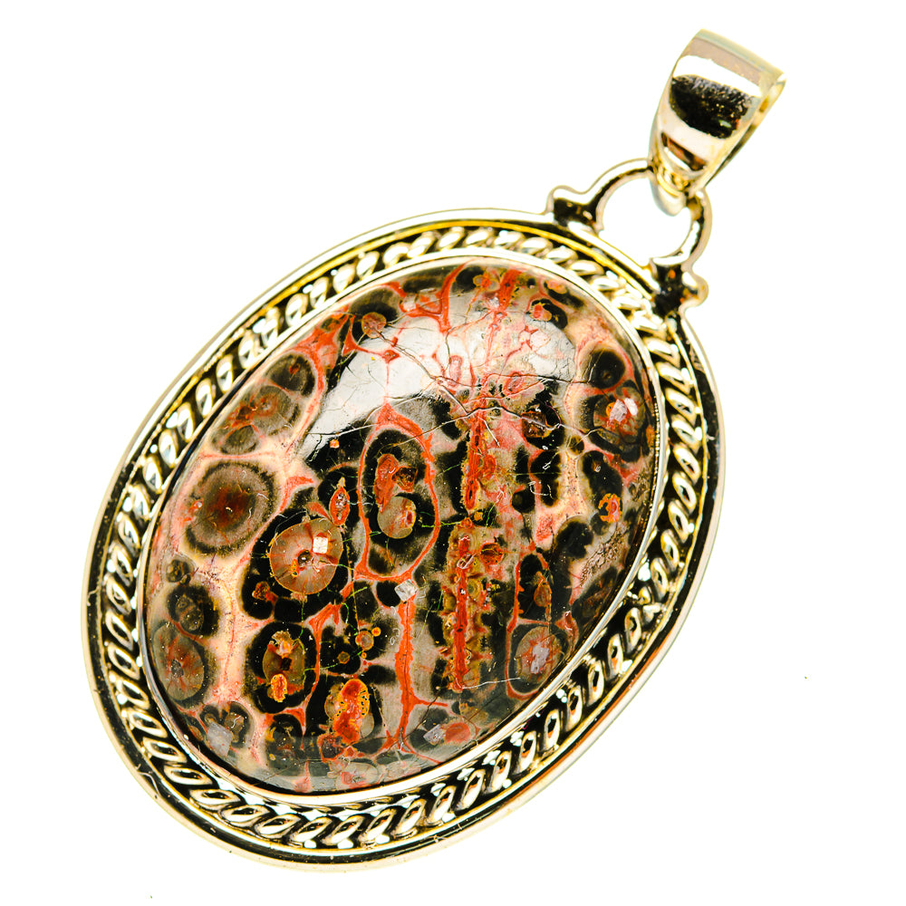 Oval jasper cabochon pendant in gold-tone sterling silver with ornate frame and bail