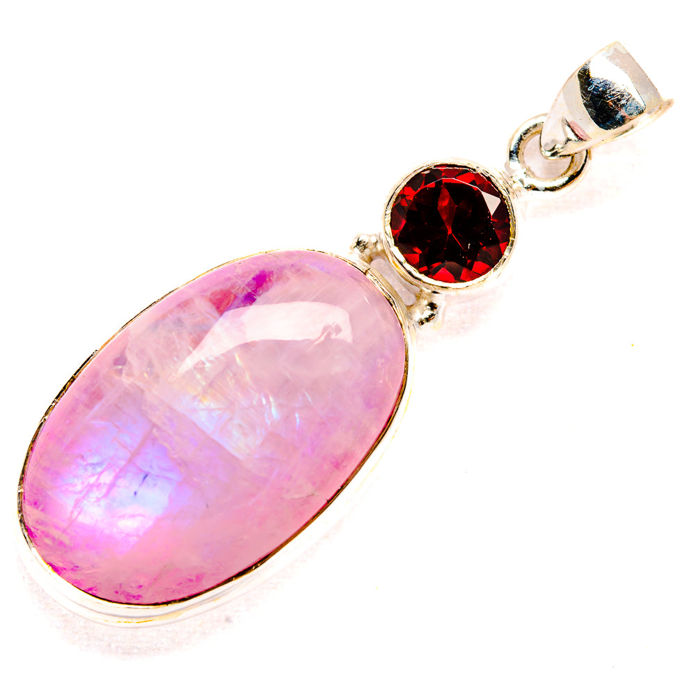 Pink oval moonstone pendant with two round red garnets and top silver bail