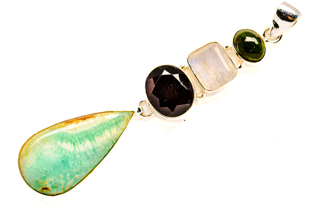 Teardrop green opal pendant with black round, pink square, and oval moonstone stones in silver bezel