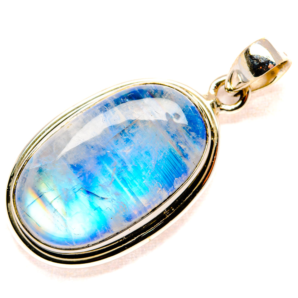 Oval sterling silver moonstone pendant with large blue rainbow cabochon and top bail