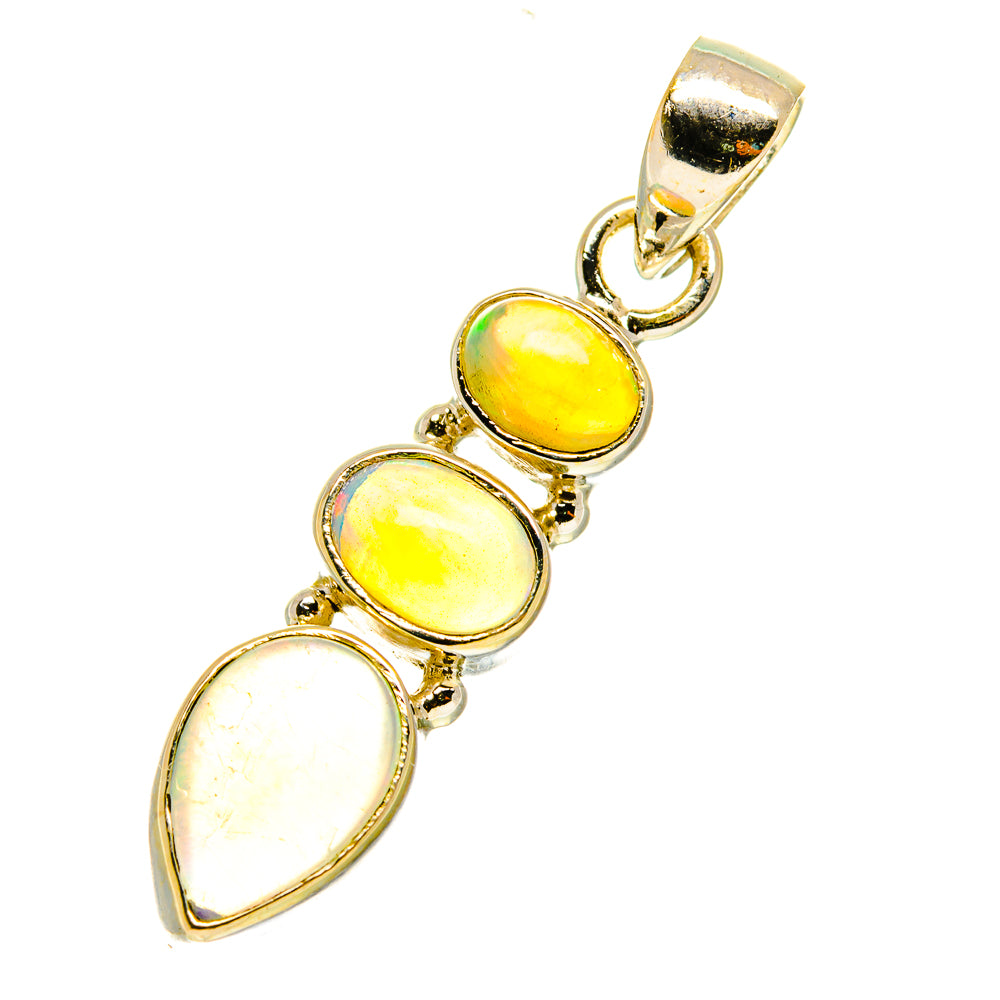 Opal pendant with oval yellow and white stones and silver bail, sterling silver setting