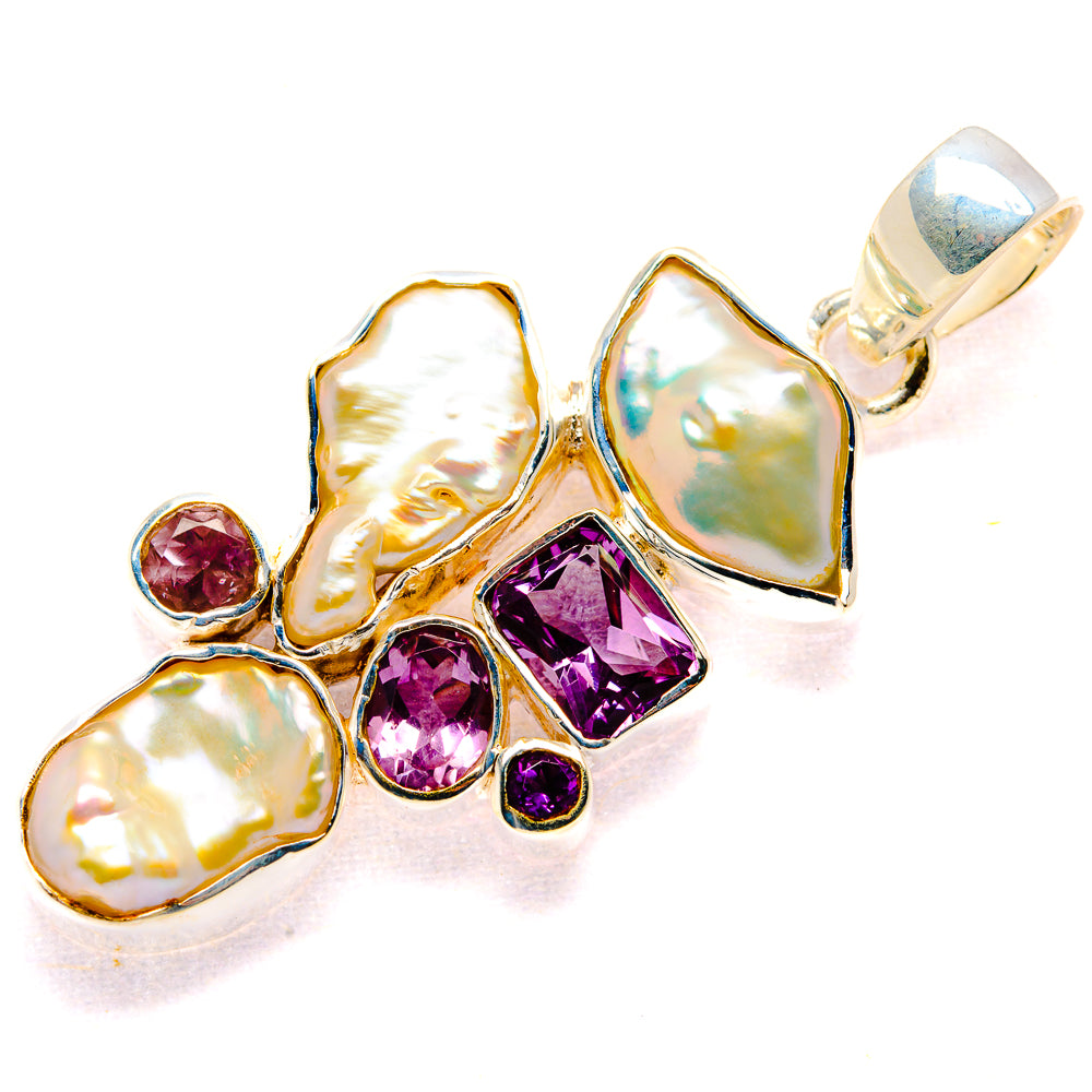 Sterling silver pendant with pearl ovals and amethyst stones, top loop bail