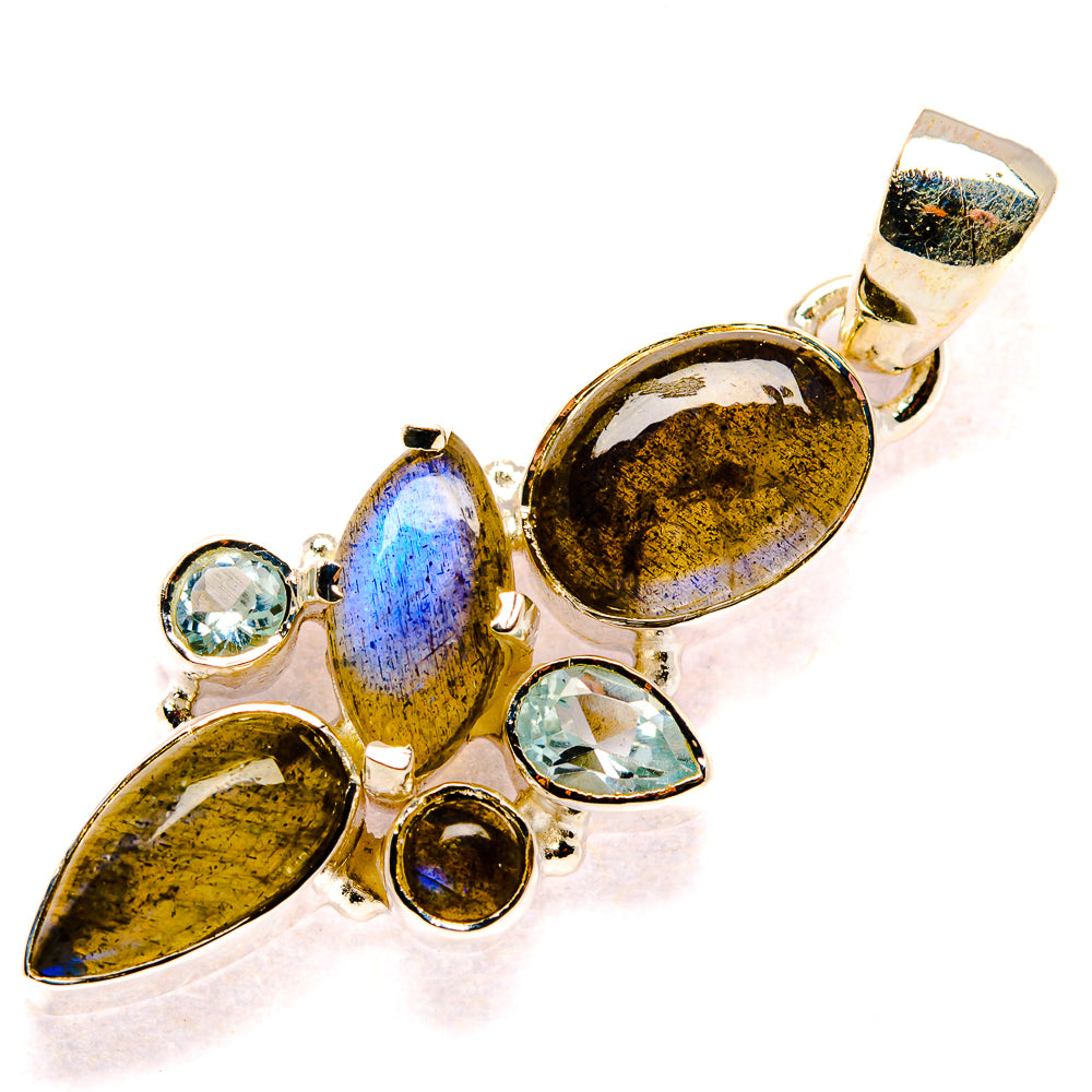 Sterling silver pendant with oval labradorite and blue topaz round accents