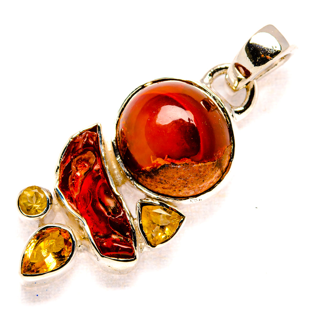 Sterling silver pendant with oval red-orange opal cabochon, yellow citrine accents