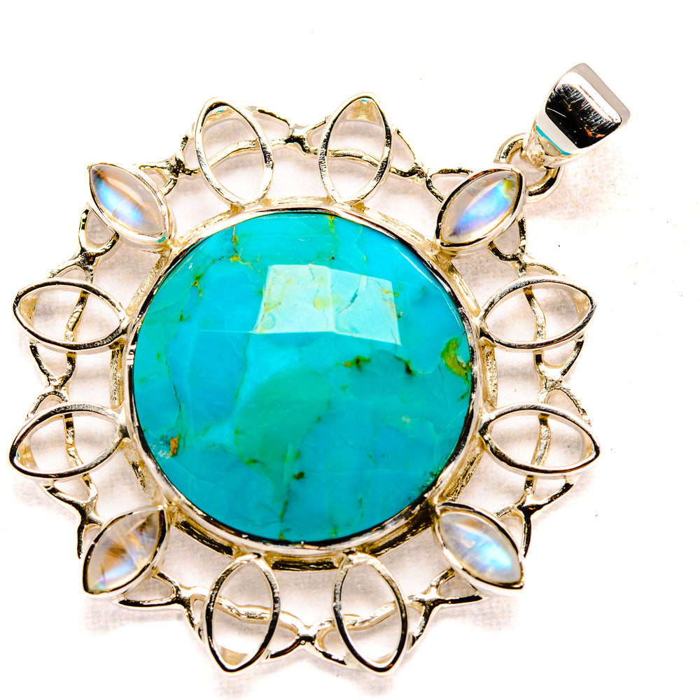 Round turquoise chrysocolla pendant with opal-like stones and silver bail, full view
