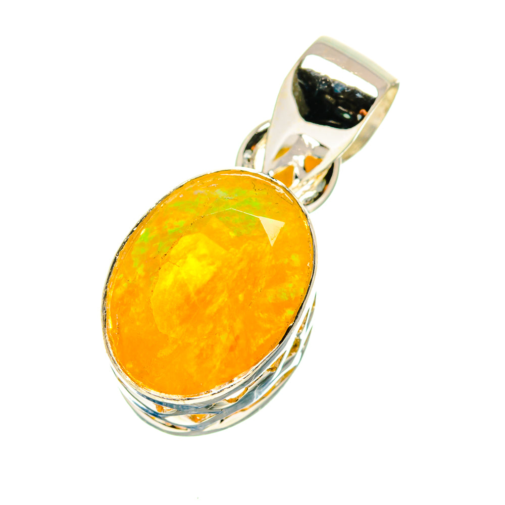 Yellow-orange oval opal pendant with faceted silver bezel and bail loop