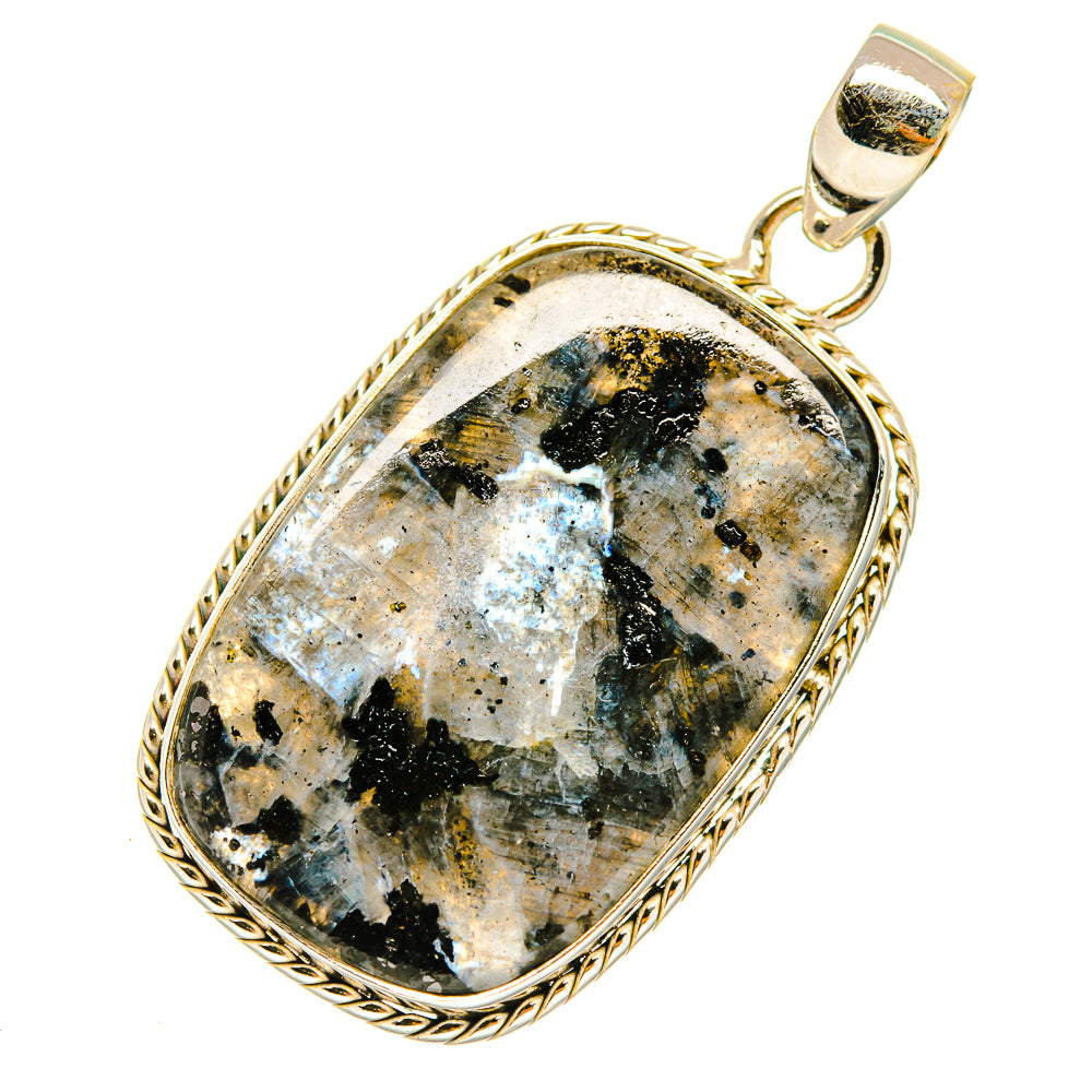 Gabbro stone pendant with ornate gold-tone 925 silver frame and oval black-blue speckled stone