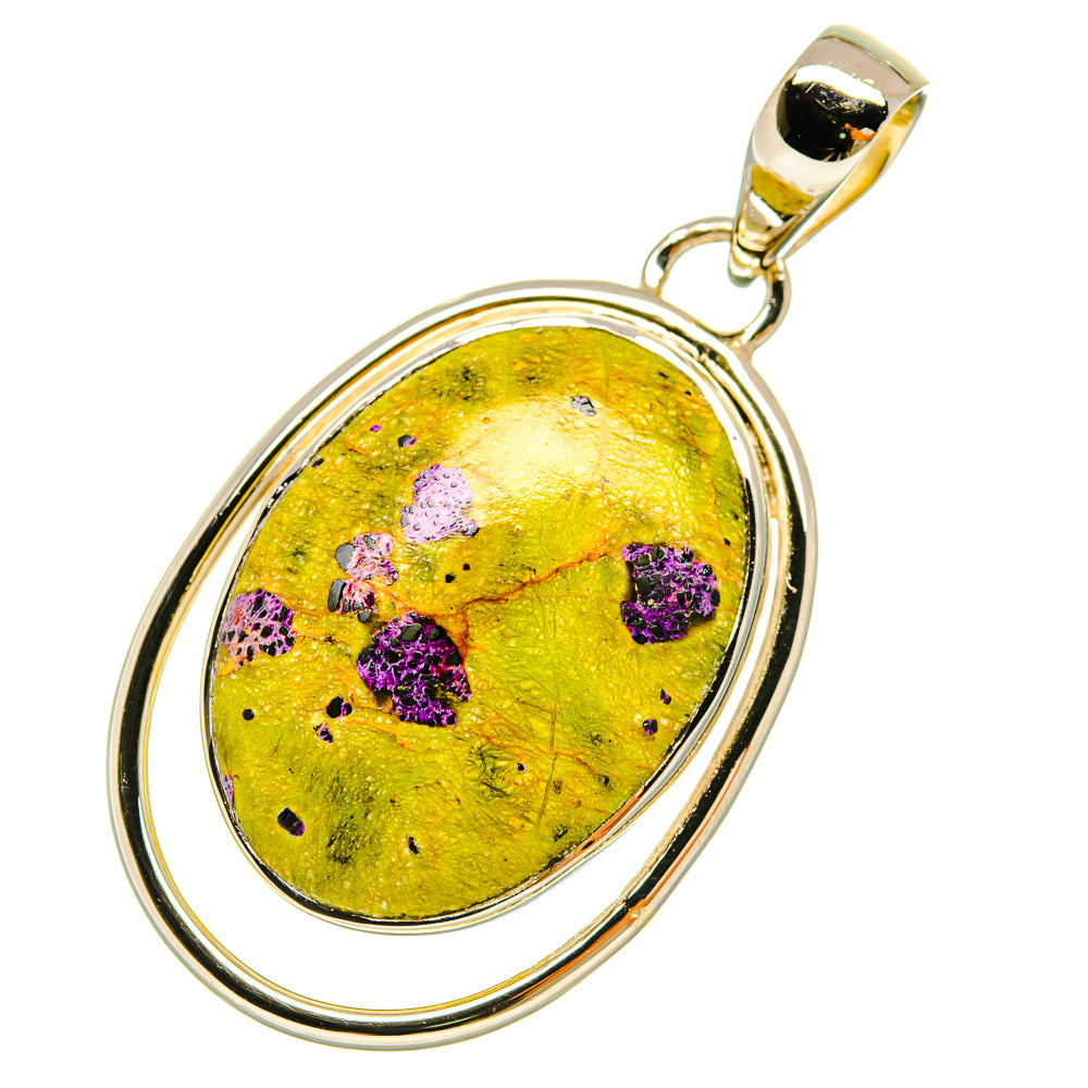 Oval sterling silver pendant with yellow Atlantisite cabochon and purple speckles, bail loop