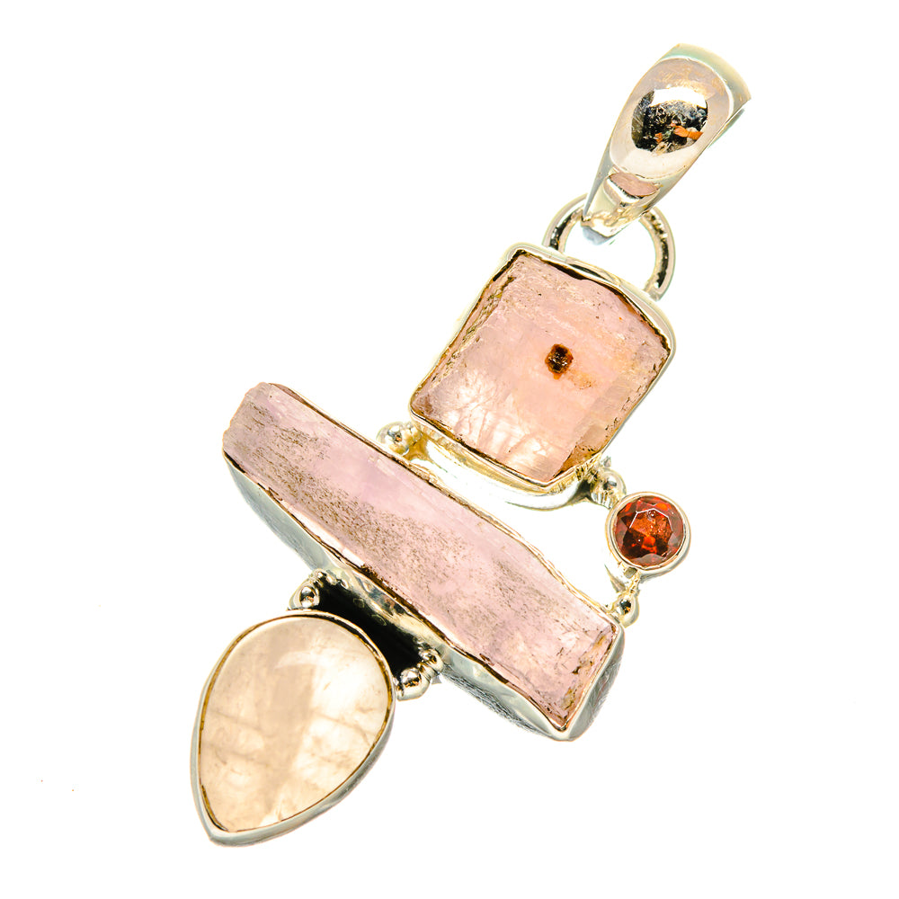 Sterling silver pendant with rough pink rectangular stone, pale oval charm, and red round gem