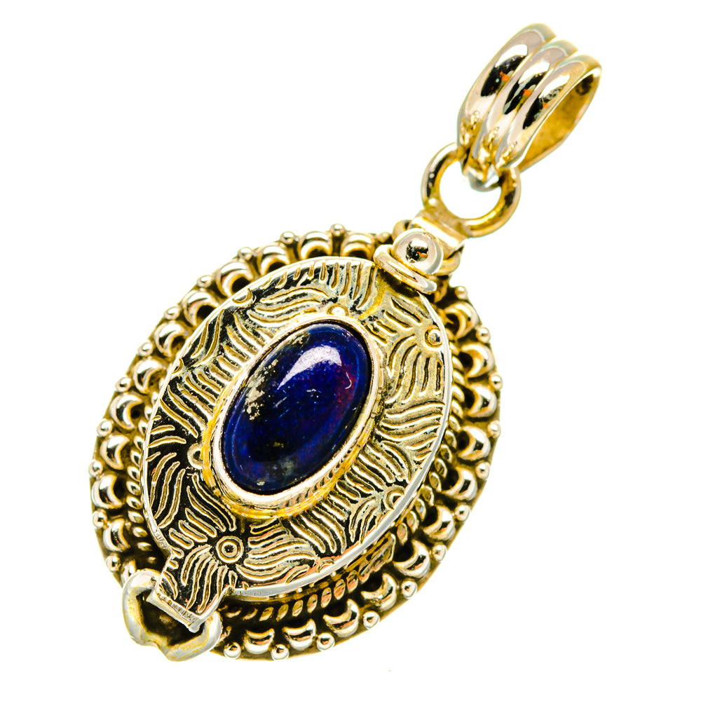 Gold-tone lapis lazuli pendant with oval stone, filigree rim, and top loop