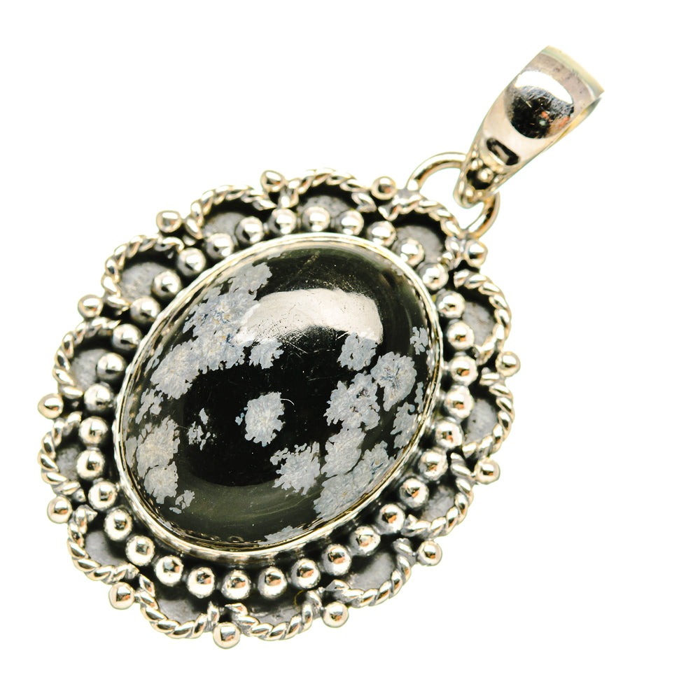 Snowflake obsidian pendant with oval black stone, silver beaded frame, and bail