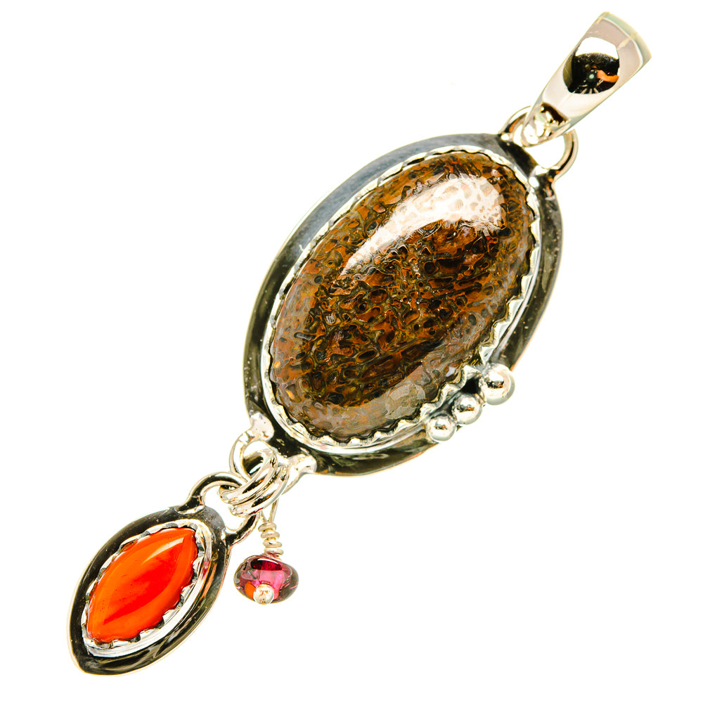 Oval brown stone pendant with red marquise accent in silver setting