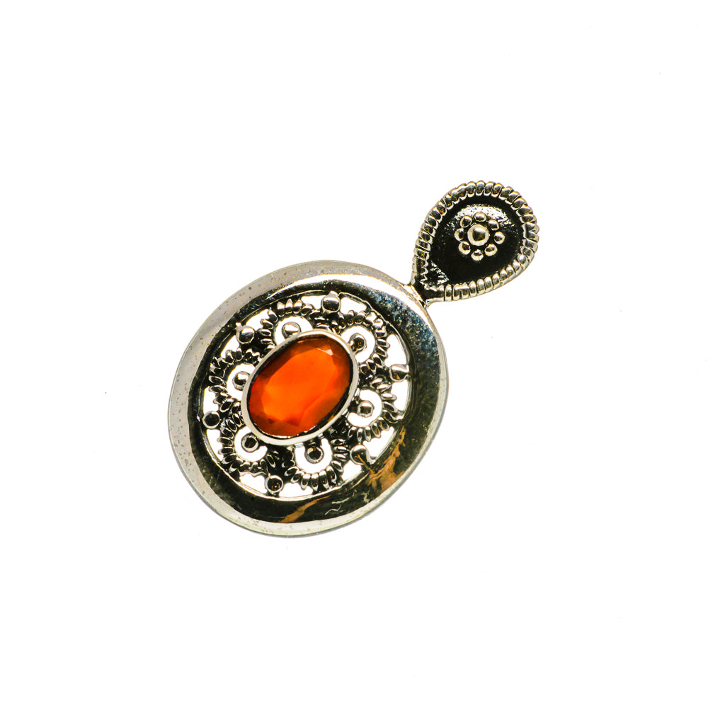 Sterling silver pendant with red onyx oval stone and ornate round bezel, bail loop