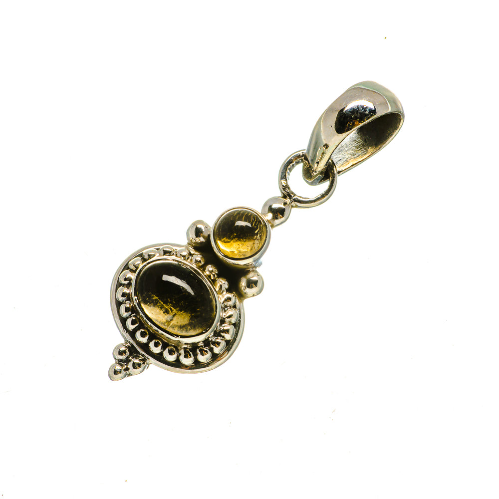 Sterling silver citrine pendant with round yellow stone and small bail loop