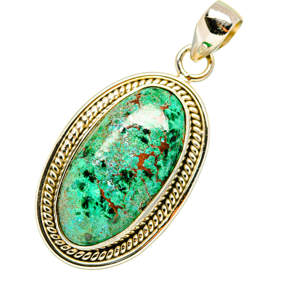 Oval turquoise pendant in ornate sterling silver frame with top bail loop