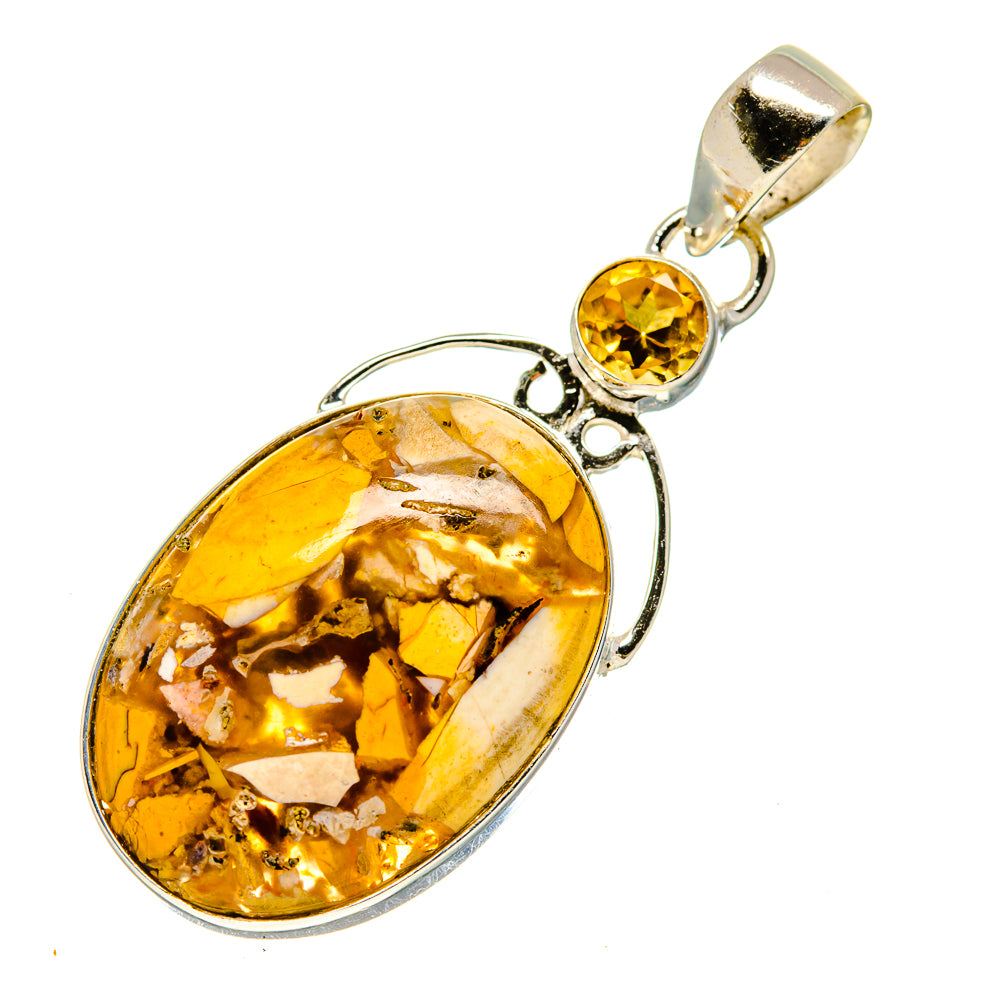 Oval amber resin pendant with round yellow gemstone, decorative silver setting and bail