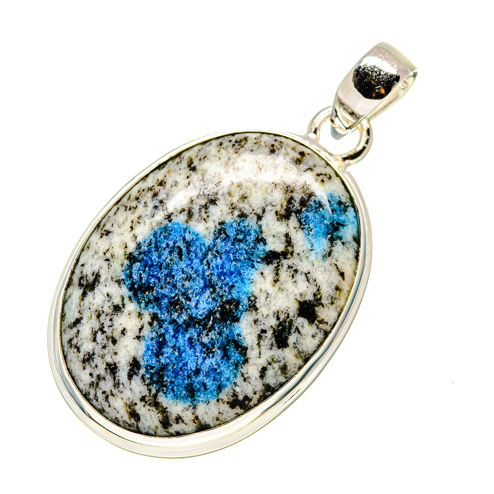 Oval blue azurite stone pendant in silver-tone bezel with loop bail