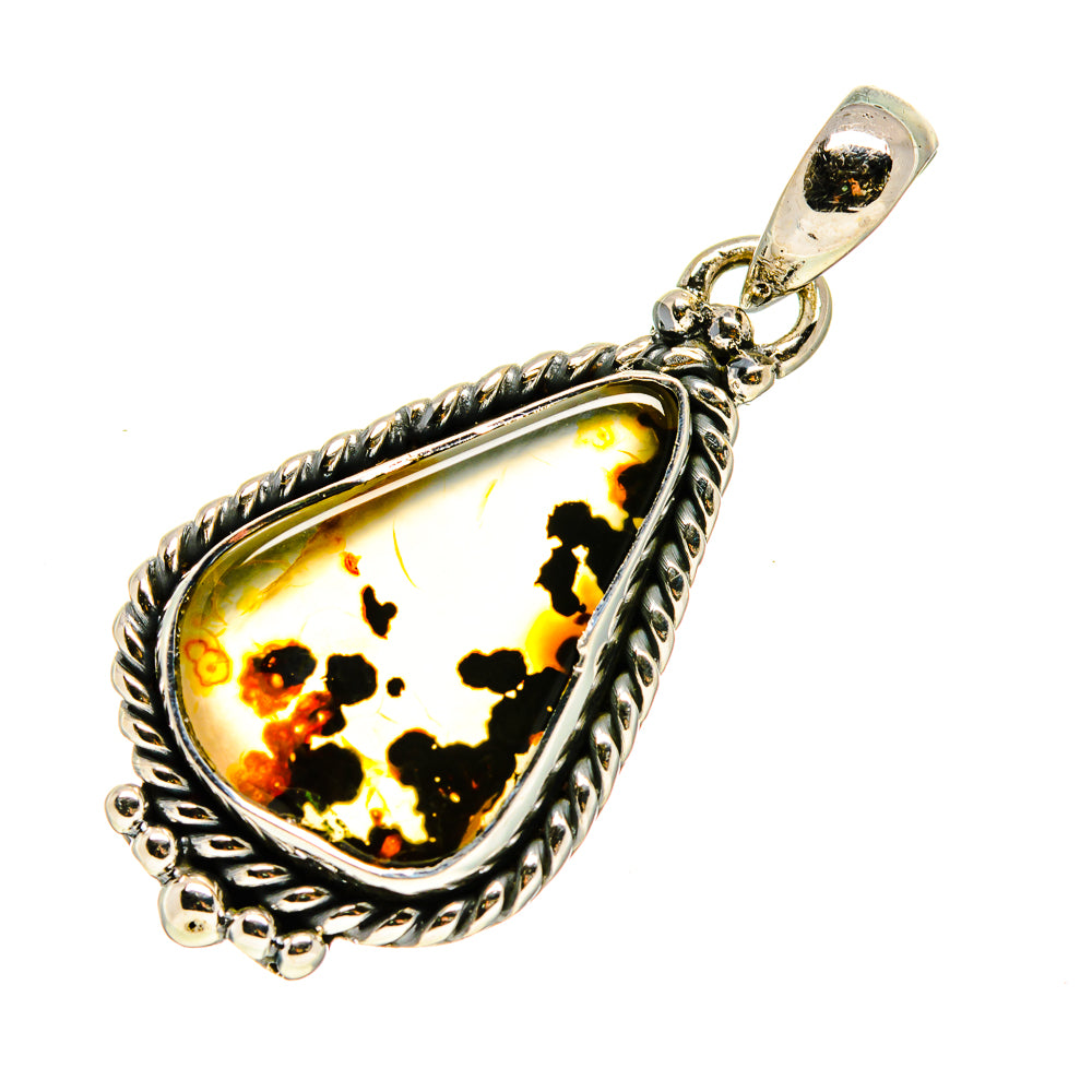 Teardrop amber agate pendant in twisted silver frame with black speckled stone