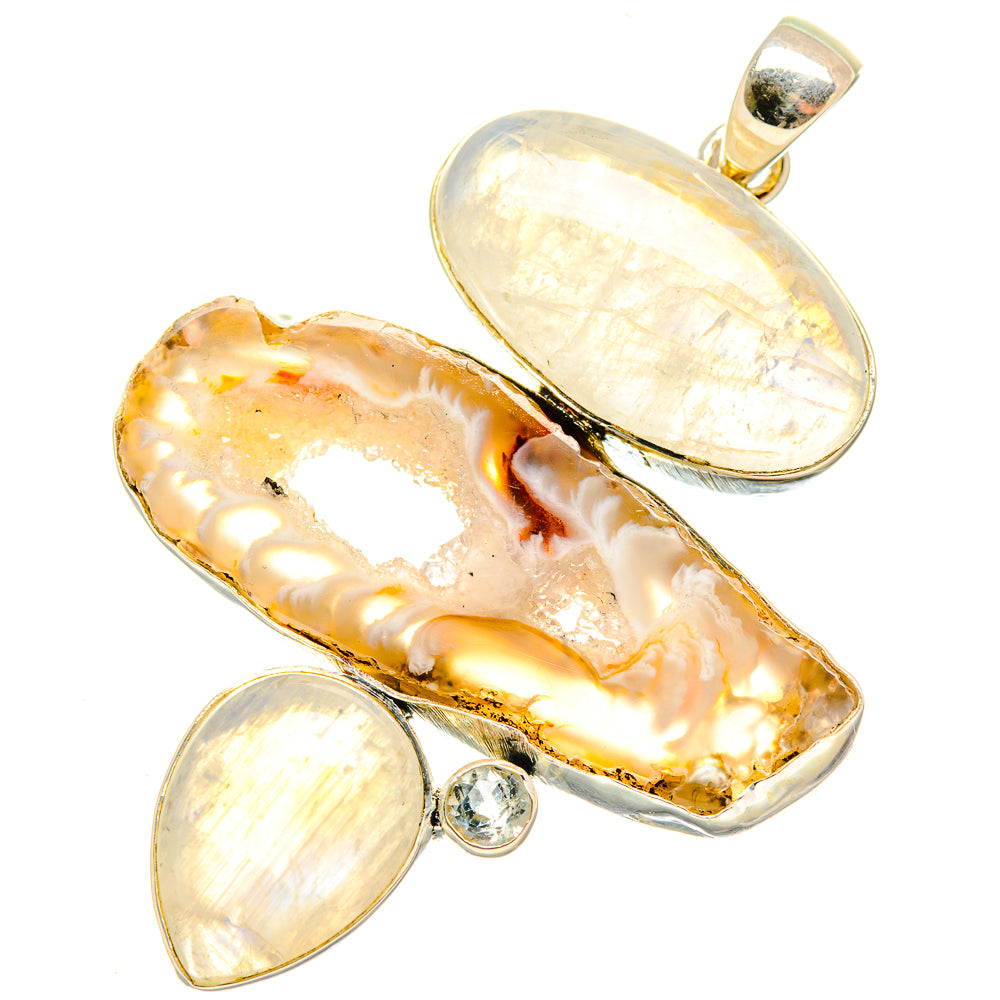 Geode-slice pendant with iridescent opal-like center and three round cabochons, silver bail