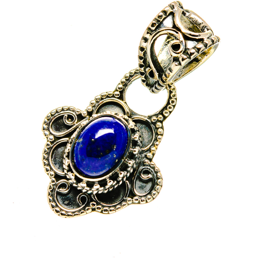 Lapis lazuli pendant with blue oval stone, loop bail, and detailed silver filigree