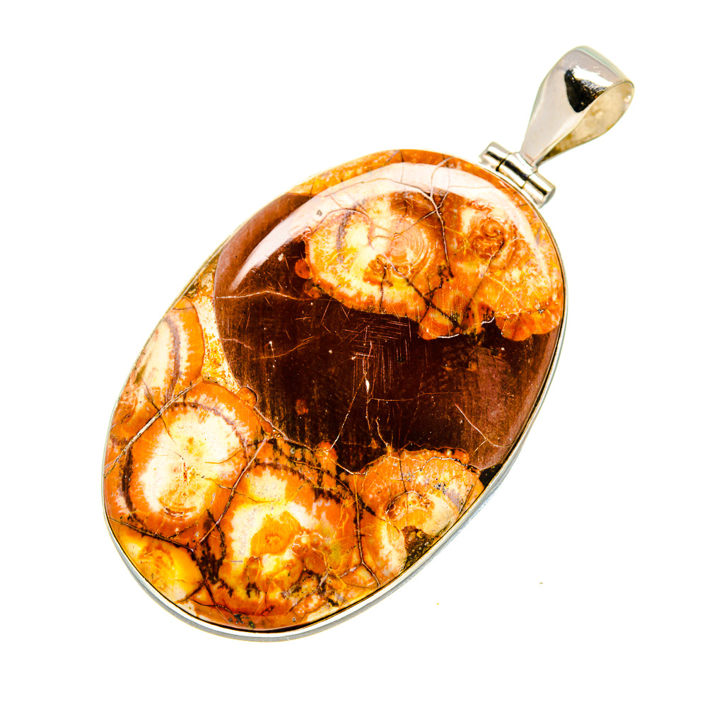 Oval orange-brown jasper pendant with silver bail and polished bezel