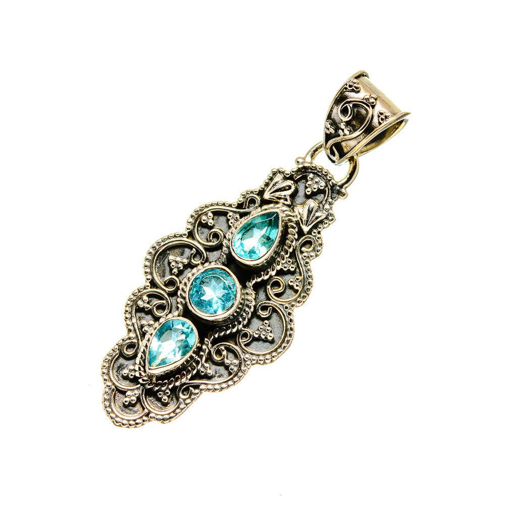 Sterling silver blue topaz pendant with bail and ornate filigree, three teardrop stones