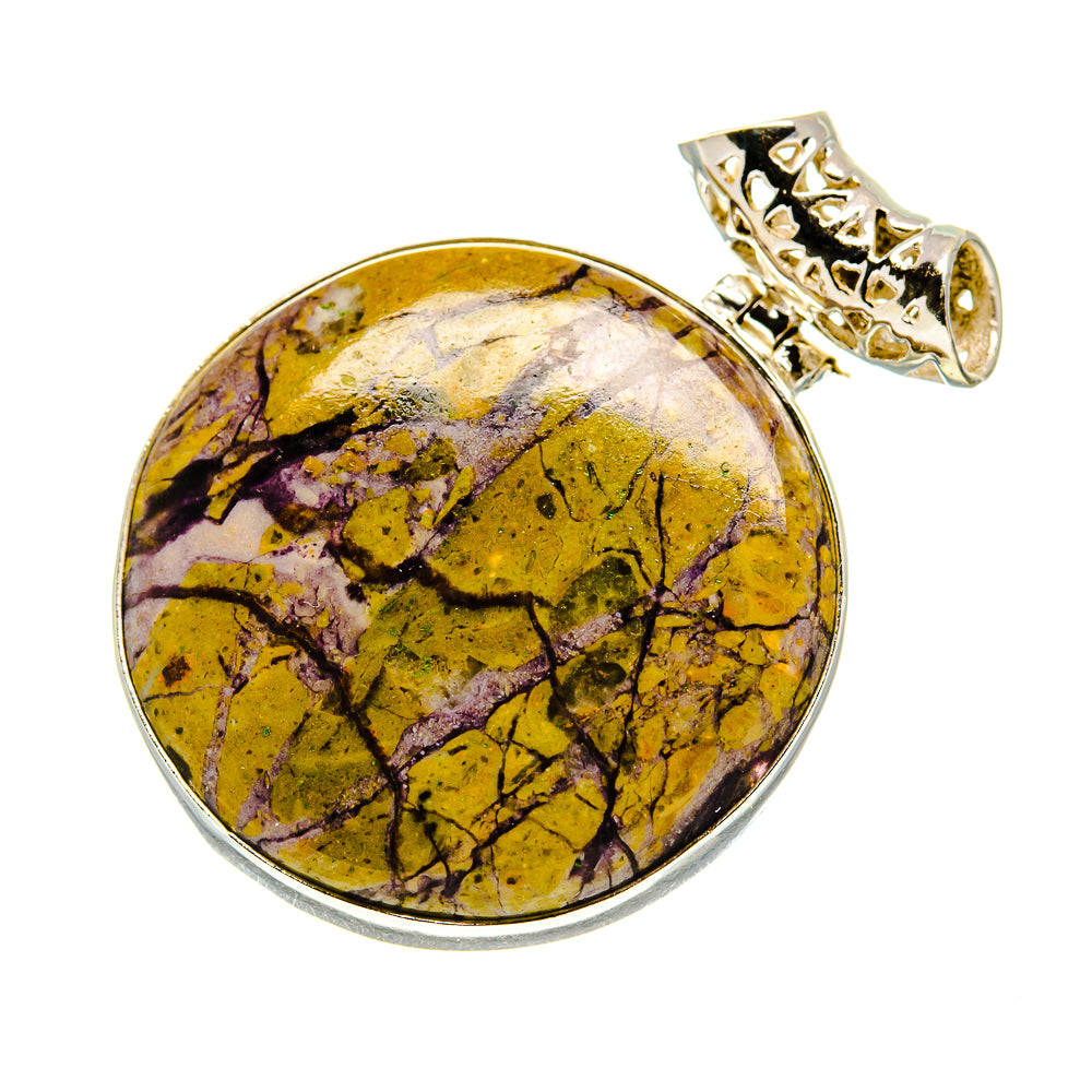 Round sterling silver pendant with yellow-purple marbled cabochon and openwork bail