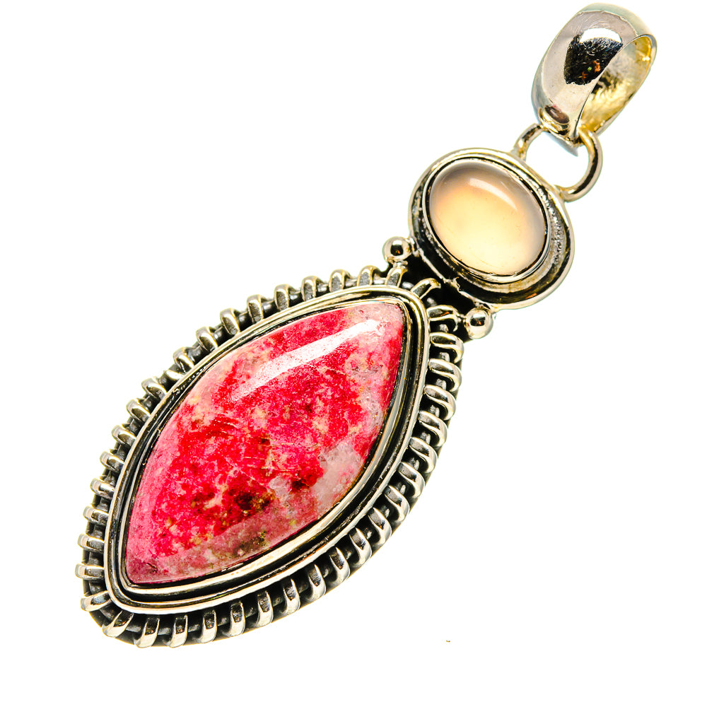 Sterling silver teardrop pendant with red stone, pale center stone, bail loop