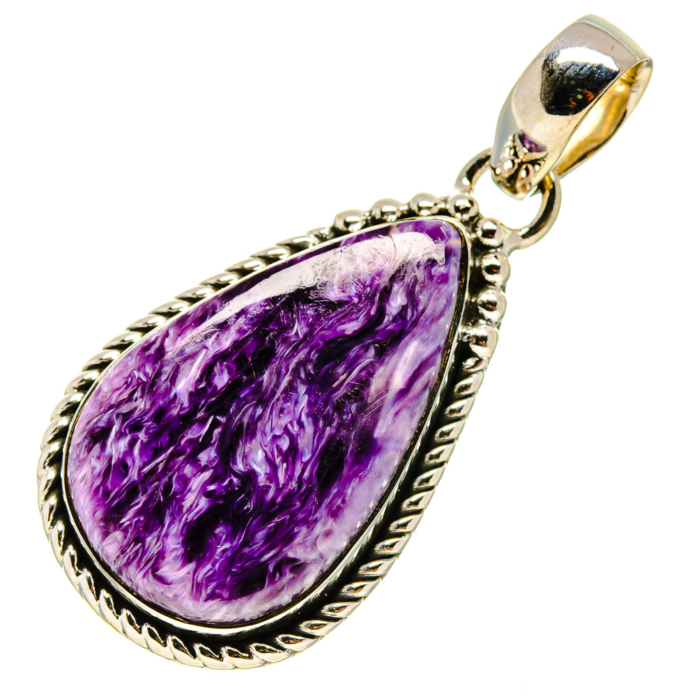 Charoite pendant with purple teardrop cabochon and silver bail, ornate border