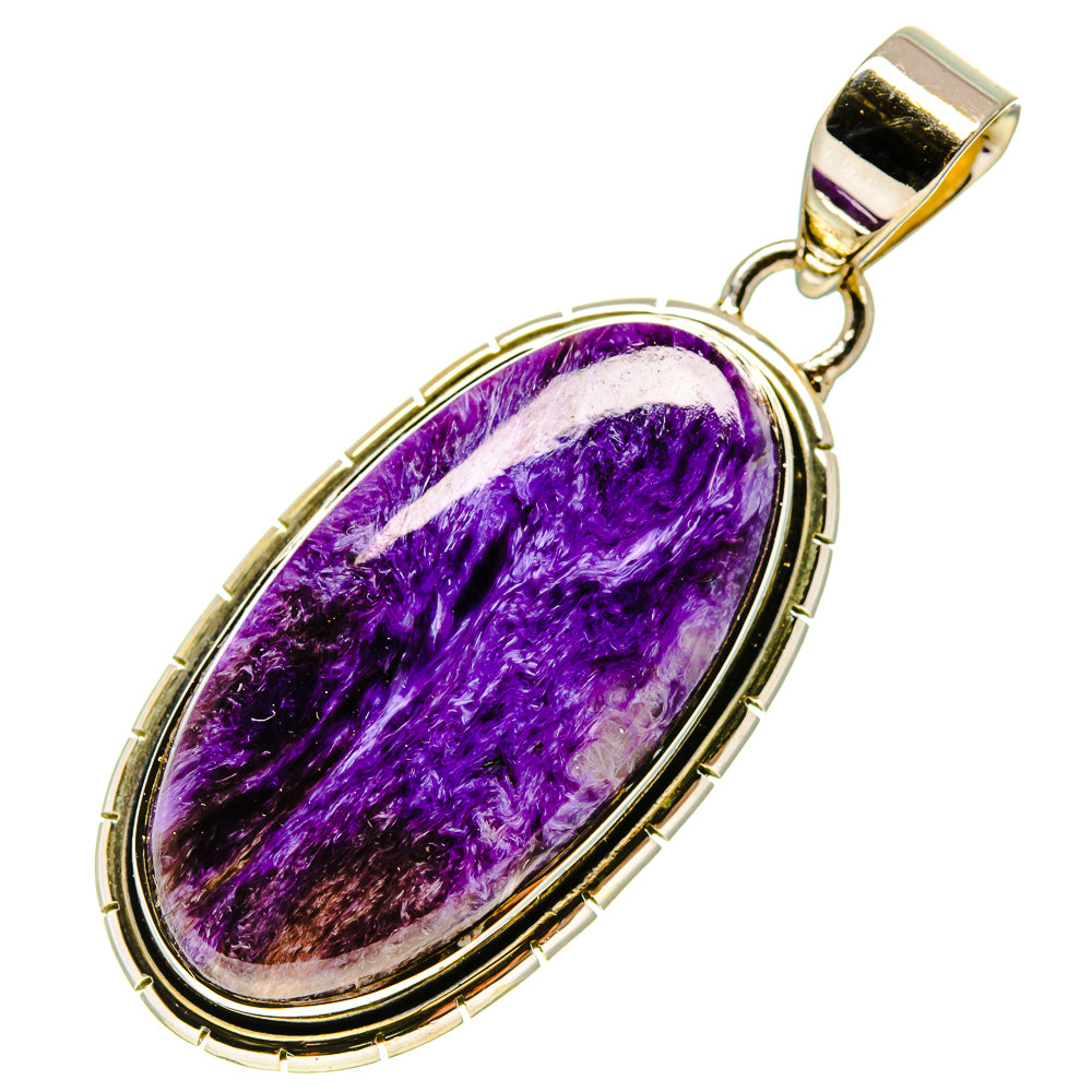 Charoite pendant in oval sterling silver bezel with purple charoite and gold-tone bail.