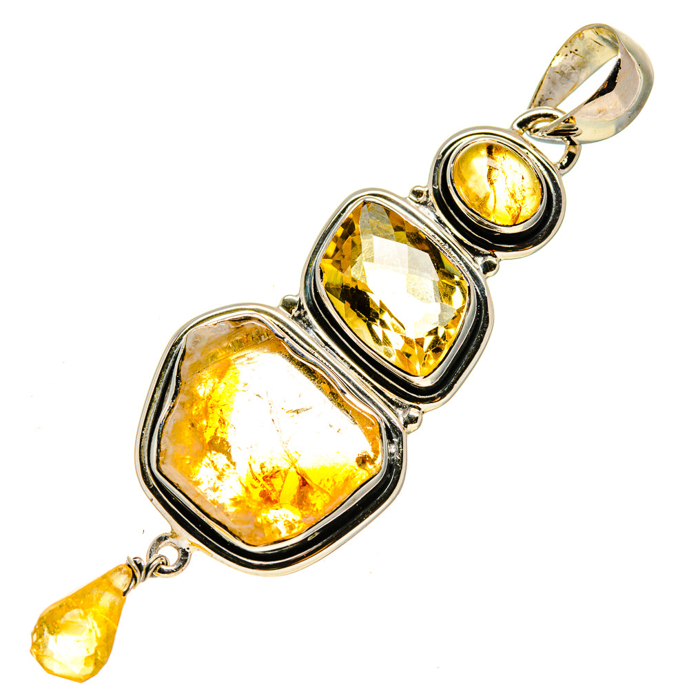Rough citrine pendant in 925 sterling silver with three faceted yellow stones, bail top