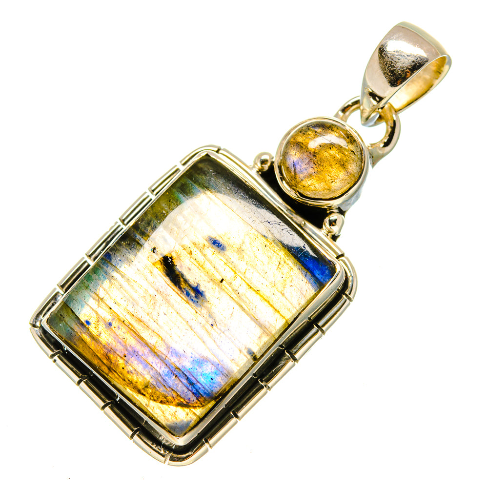Labradorite pendant with rectangular faceted stone, sterling silver bezel and round top cabochon