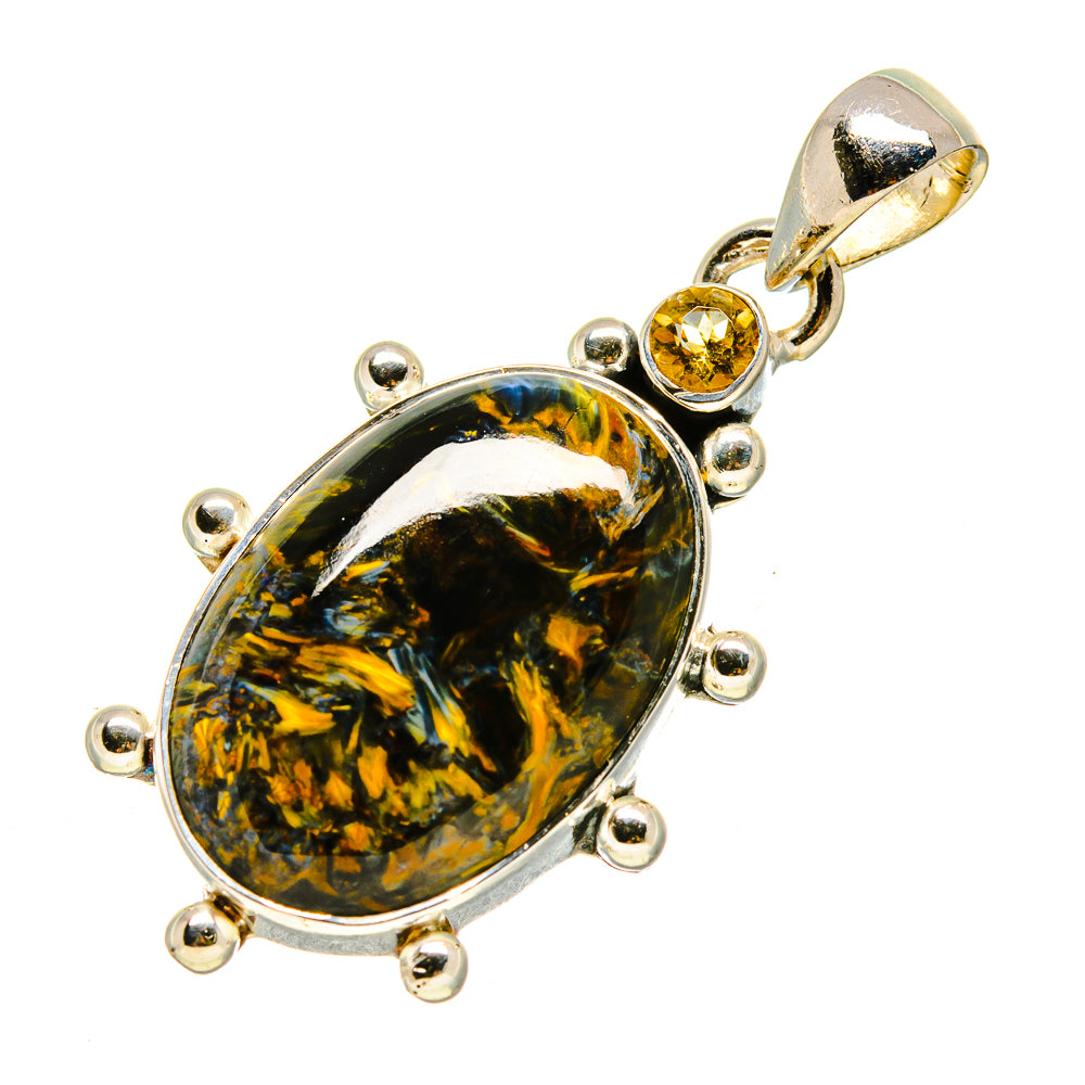 925 sterling silver pendant with oval pietersite and small citrine accents.