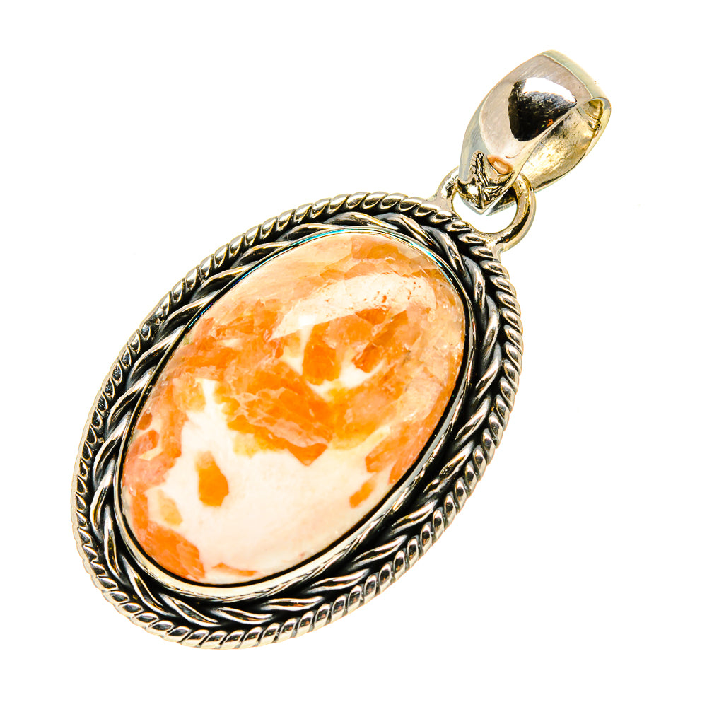 Scolecite pendant with oval orange-and-white stone in ornate silver bezel and bail