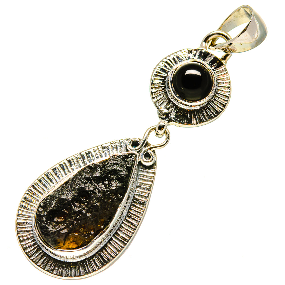 Black onyx teardrop pendant with sterling silver textured bezel and side bail