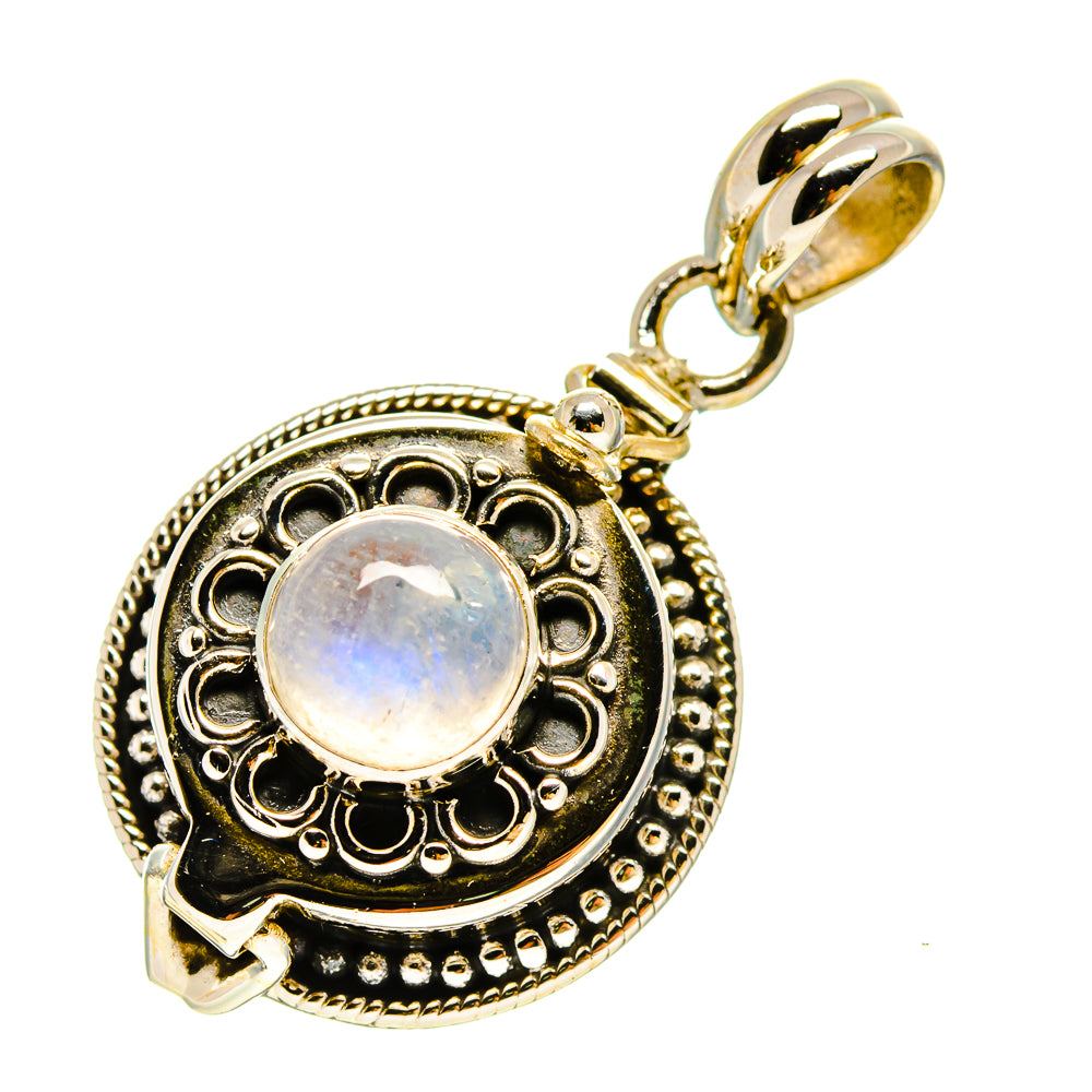 Sterling silver poison pendant with round rainbow moonstone cabochon and ornate bezel