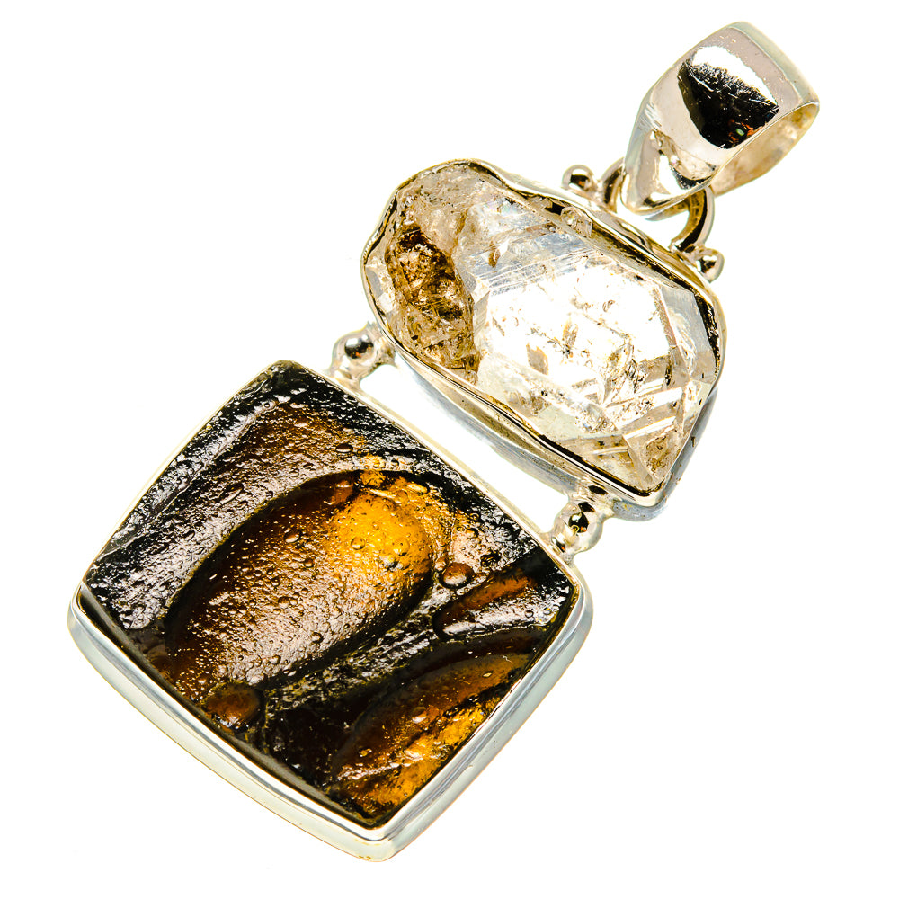 Sterling silver pendant with clear faceted crystal and dark tektite stone in bezel setting
