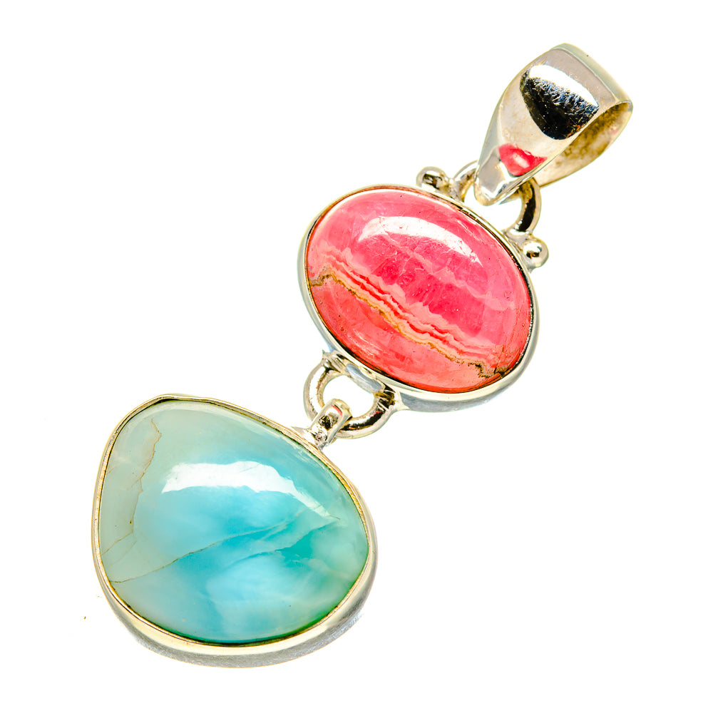 Sterling silver chain pendant with oval pink gemstone and oval blue gemstone, side view.