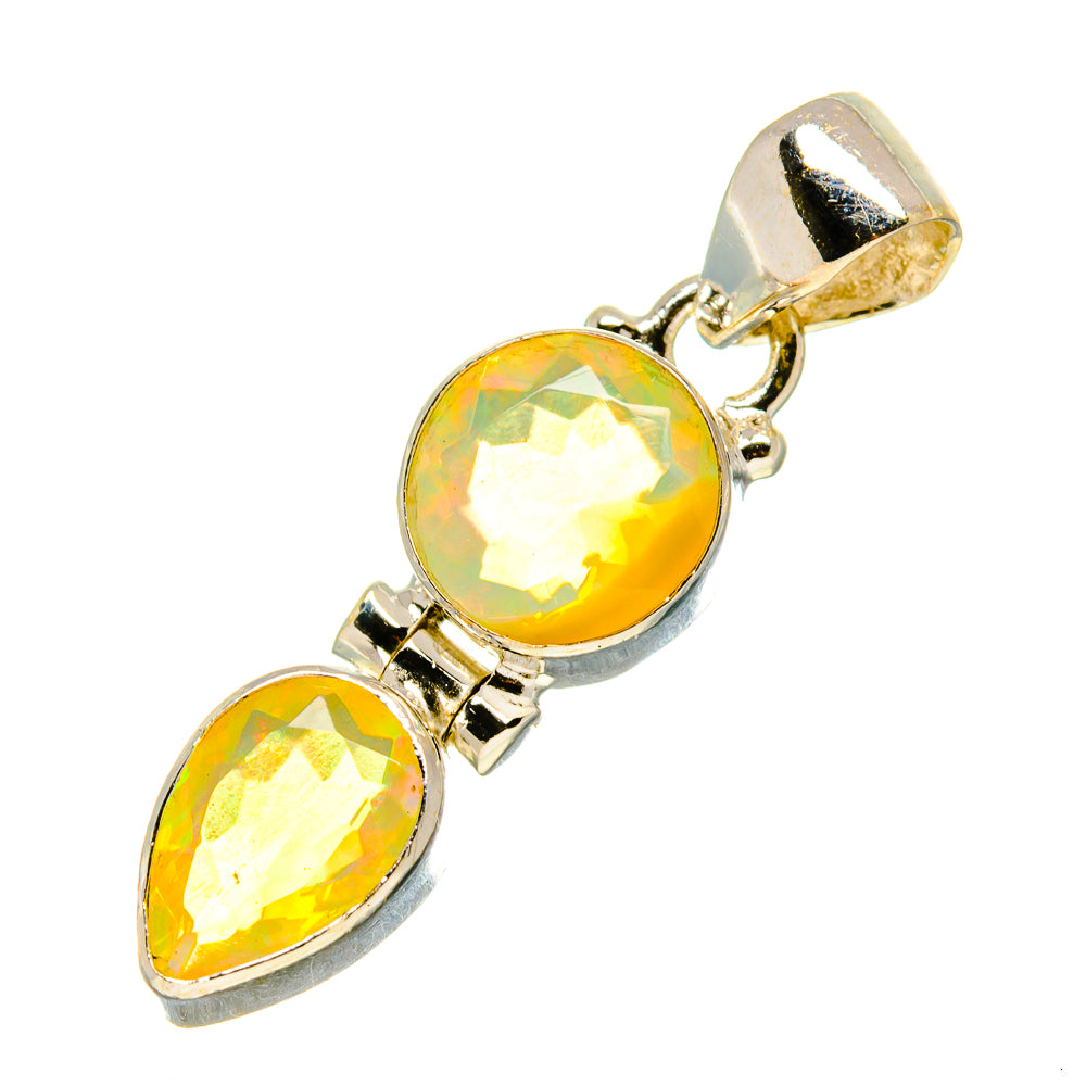 Sterling silver opal pendant with two faceted teardrop gemstones, yellow-orange glow