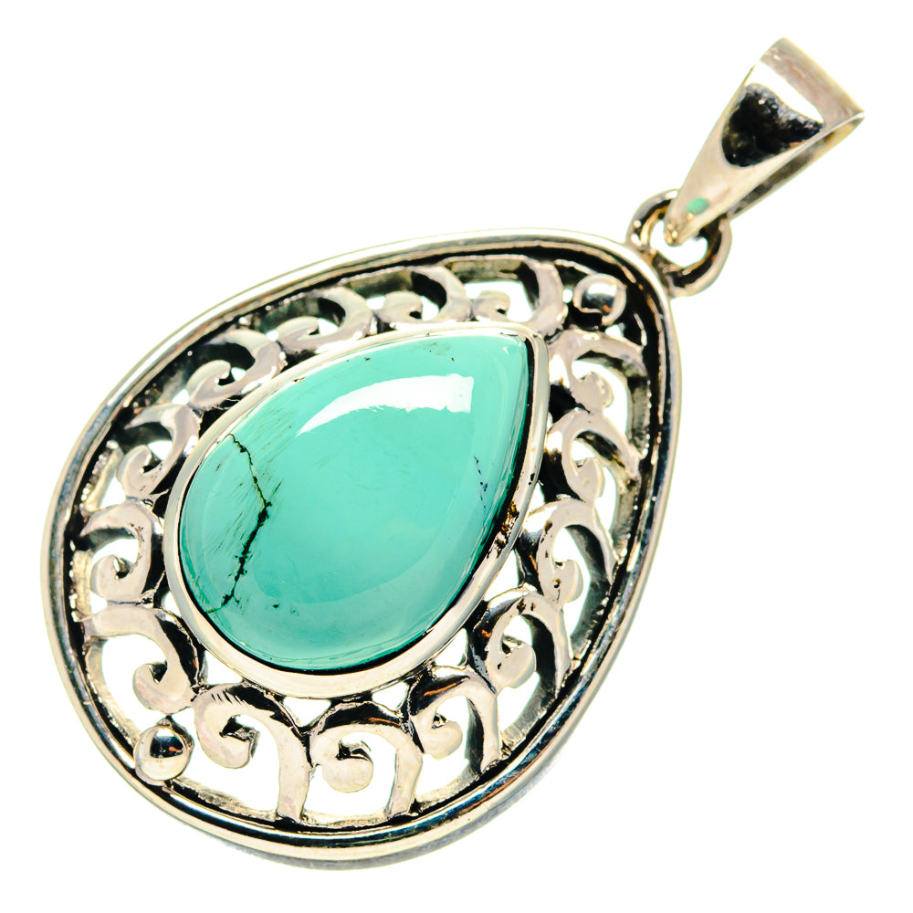 Turquoise teardrop pendant with openwork silver filigree border and top loop