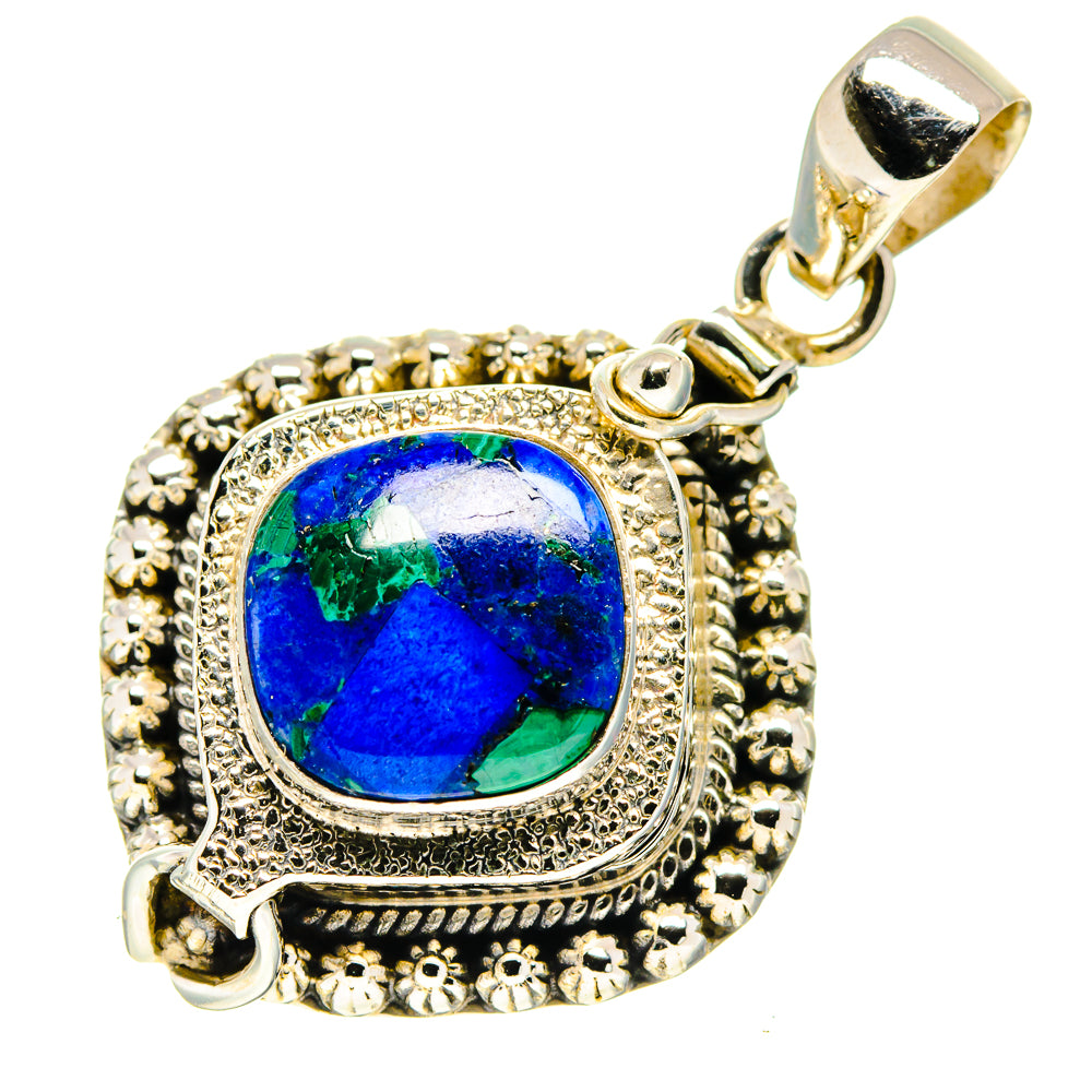 Sterling silver azurite pendant with blue-green cabochon stone in ornate bezel