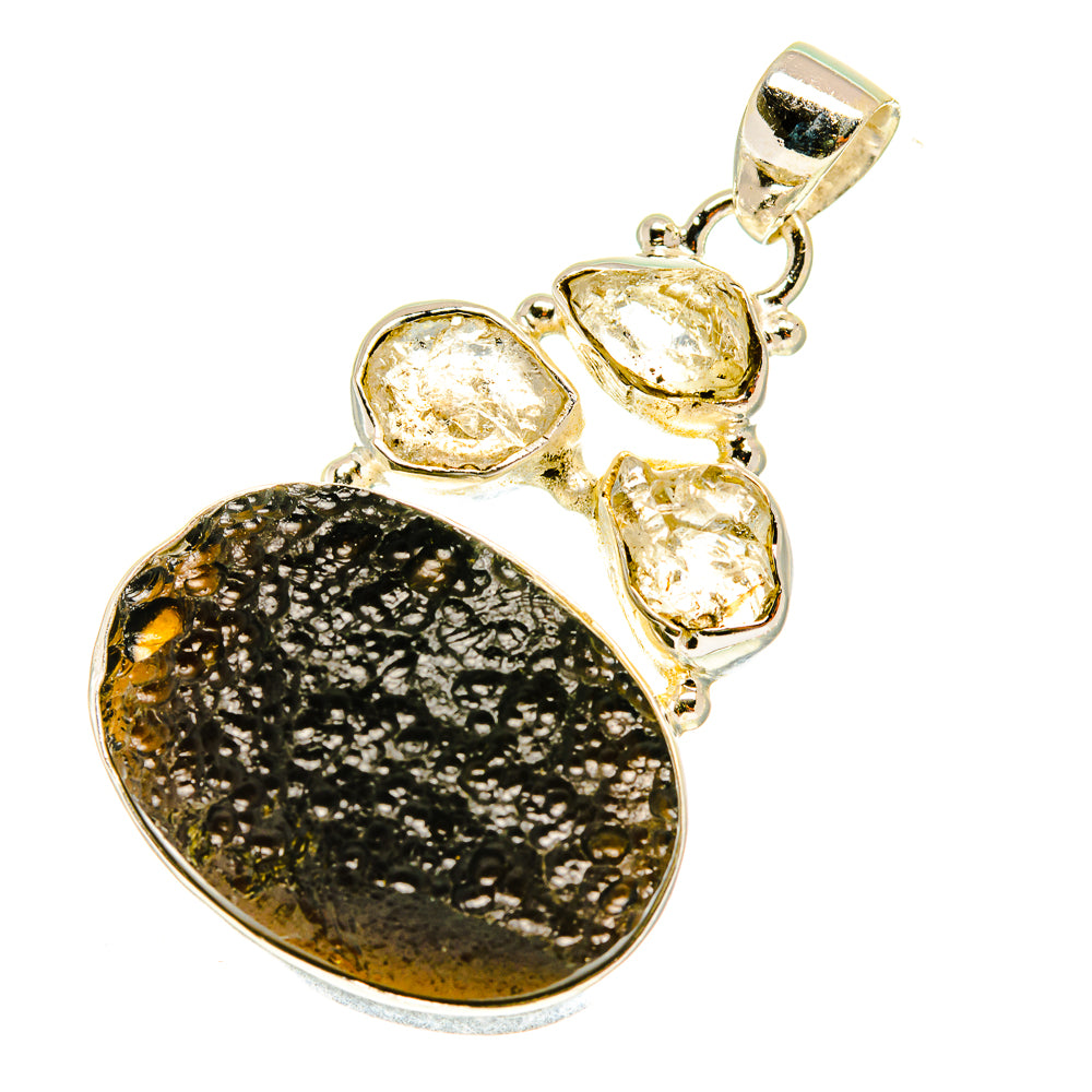 Tektite and Herkimer diamond pendant, oval black tektite with clear bezel-set stones in silver