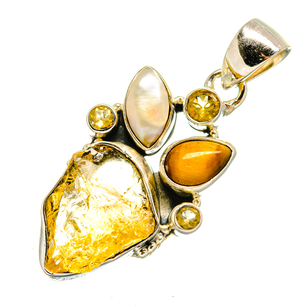 Sterling silver gemstone pendant with rough yellow crystal, amber oval stone, and mother-of-pearl