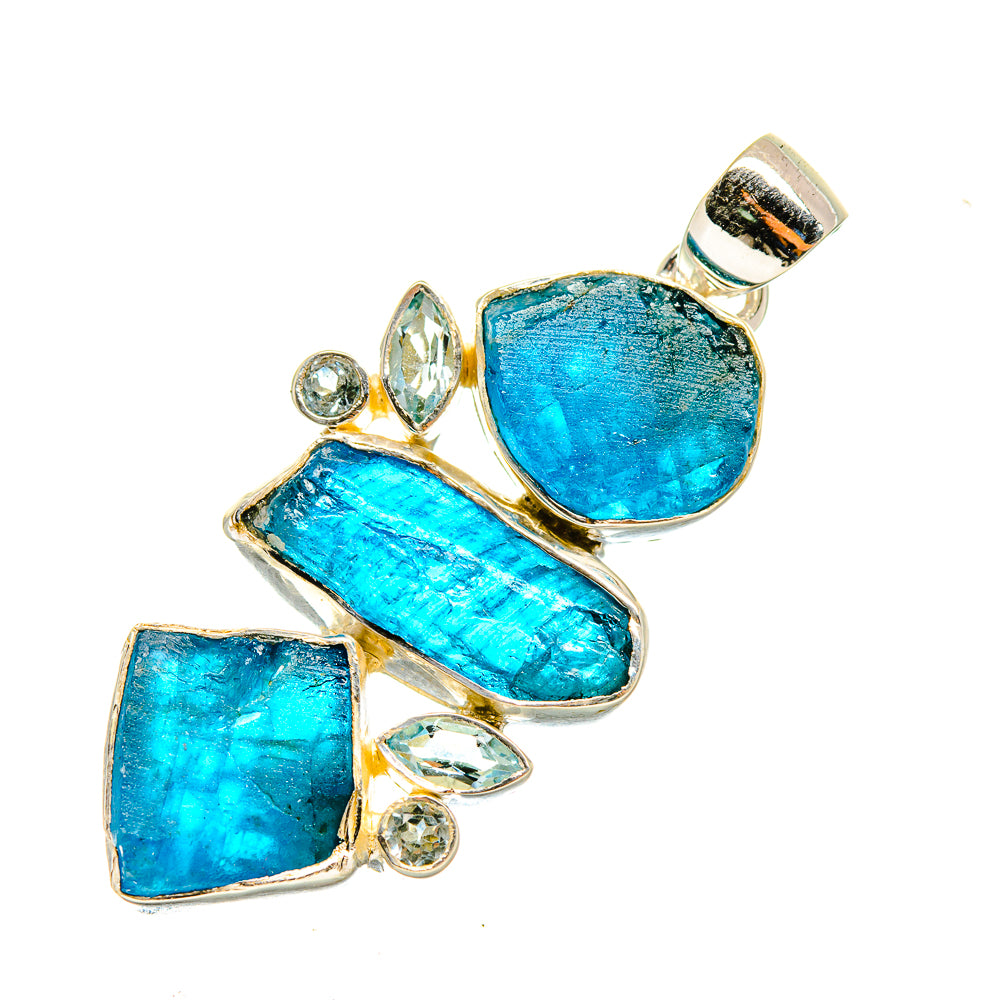 Sterling silver pendant with rough blue gemstones and round clear stones, top bail