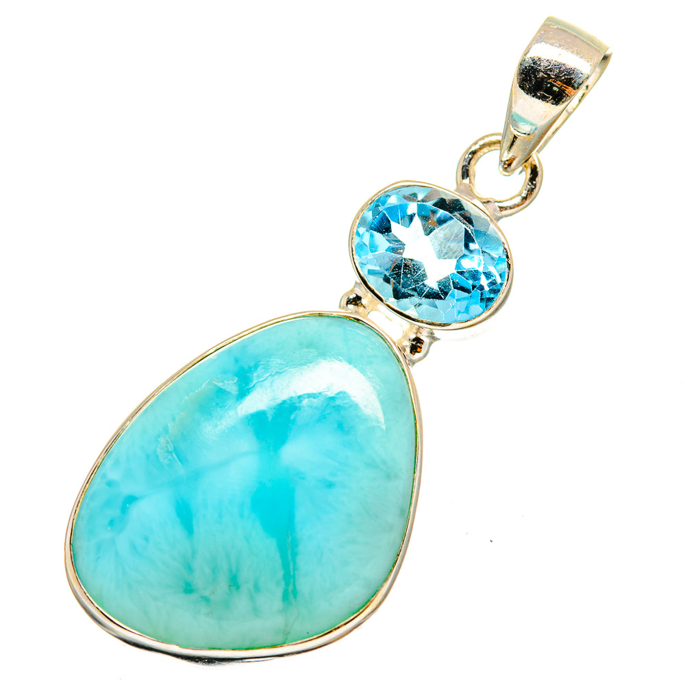 Sterling silver pendant with oval blue larimar and round blue topaz center stone