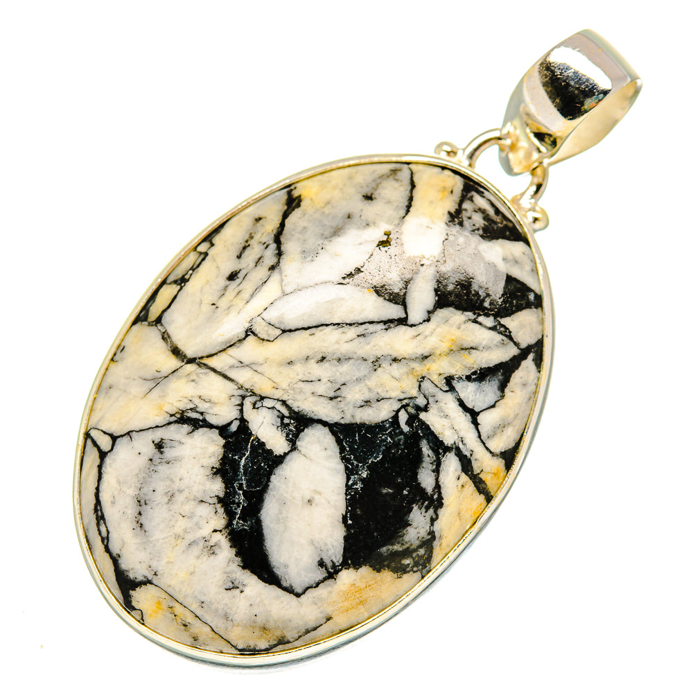 Oval jasper stone pendant with black-and-white marbled pattern and gold-tone bail