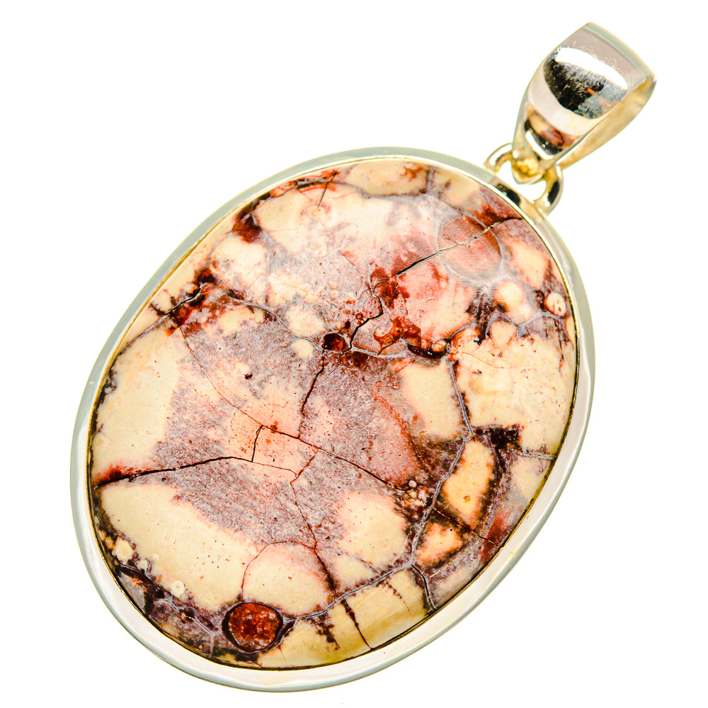 Sterling silver pendant with oval poppy jasper cabochon, red veins on beige stone.