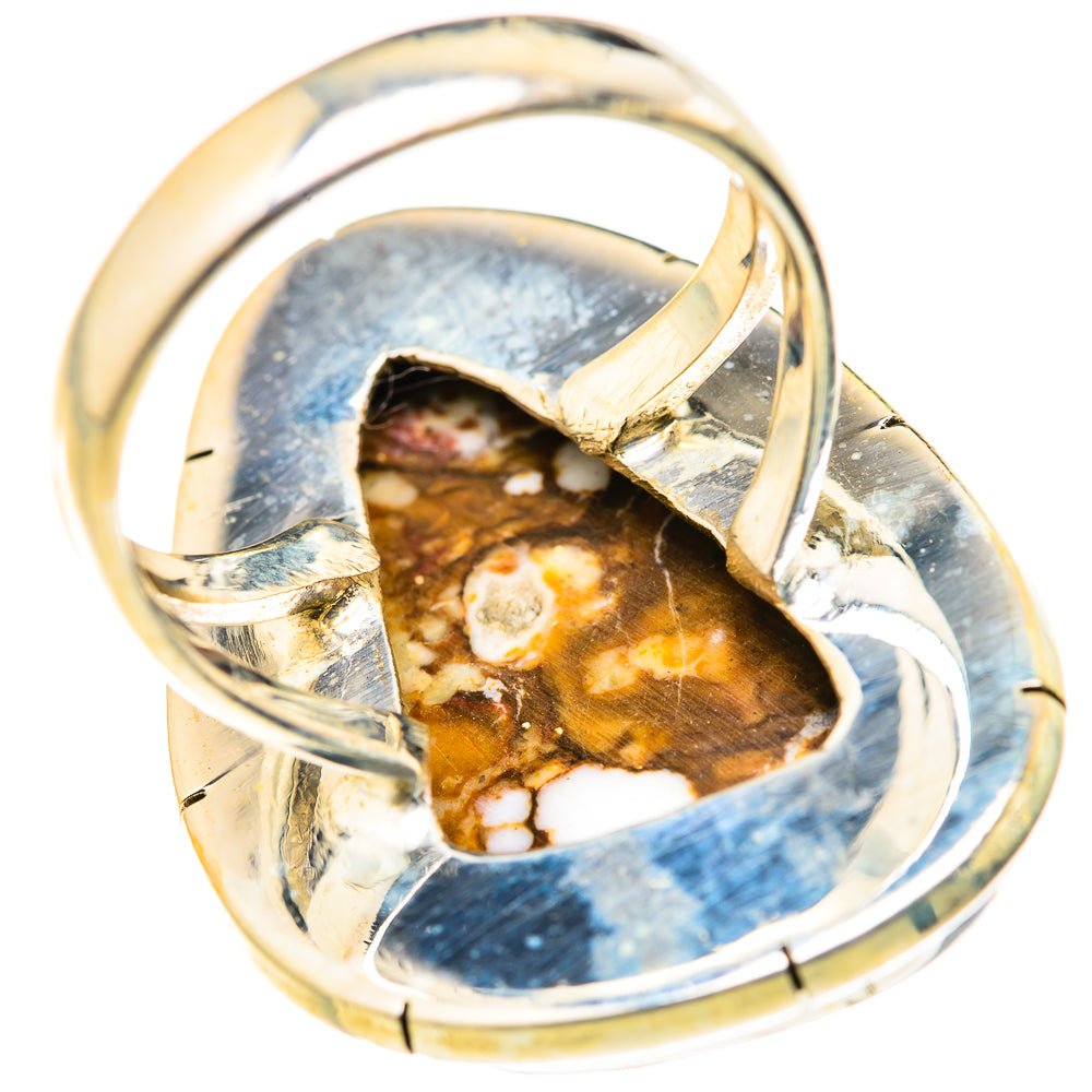 Oval sterling silver ring with raised jasper stone and split-metal band detail, brown and white